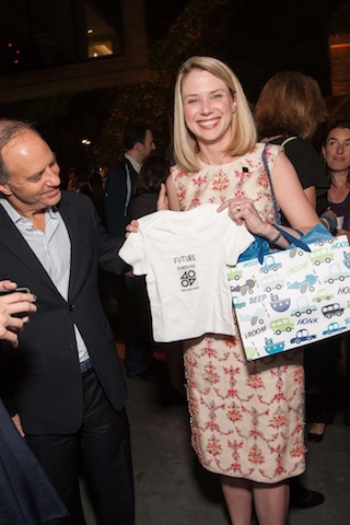 Fortune's Andy Serwer, and Marissa Mayer getting a cute Fortune tee-shirt for her baby