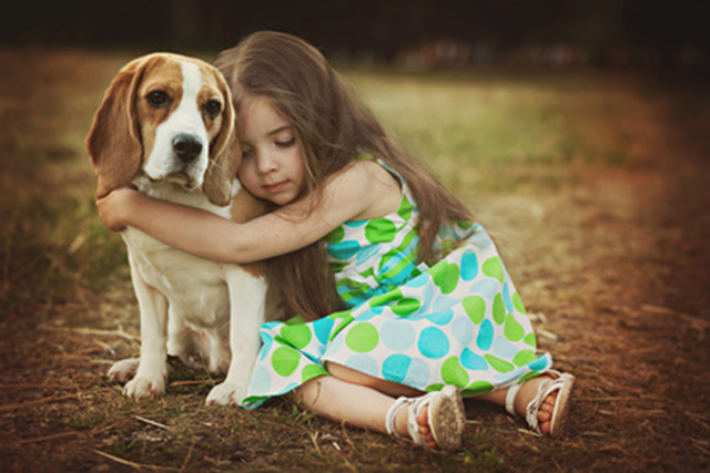 Kids who grow up with dogs have lower asthma risk